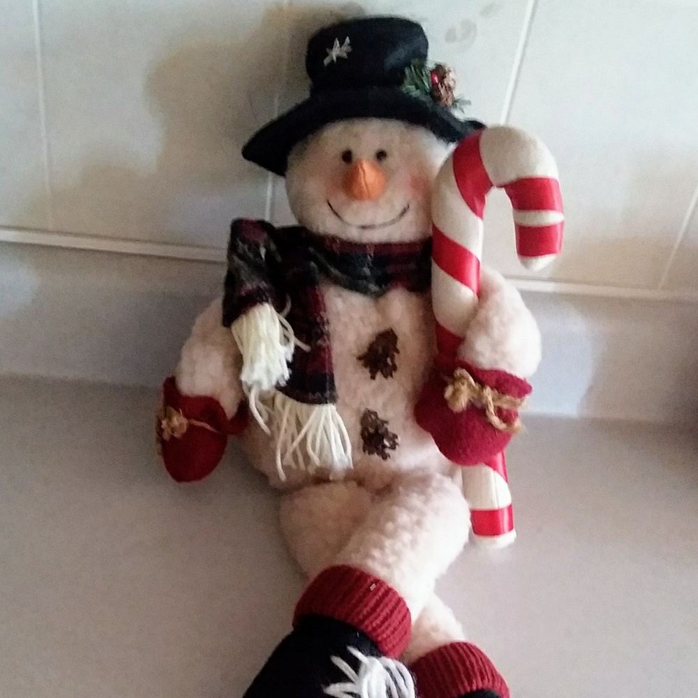 Collectible vintage stuffed snowman.